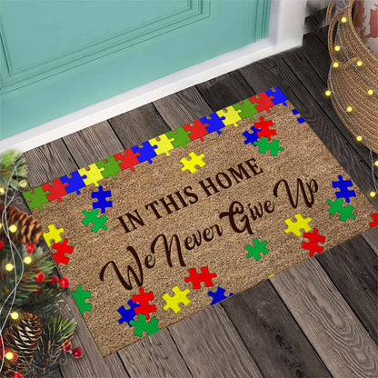 In This Home We Never Give Up - Autism Awareness Coir Pattern Print Doormat