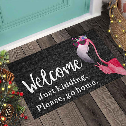 Welcome Just Kidding - Flamingo Doormat